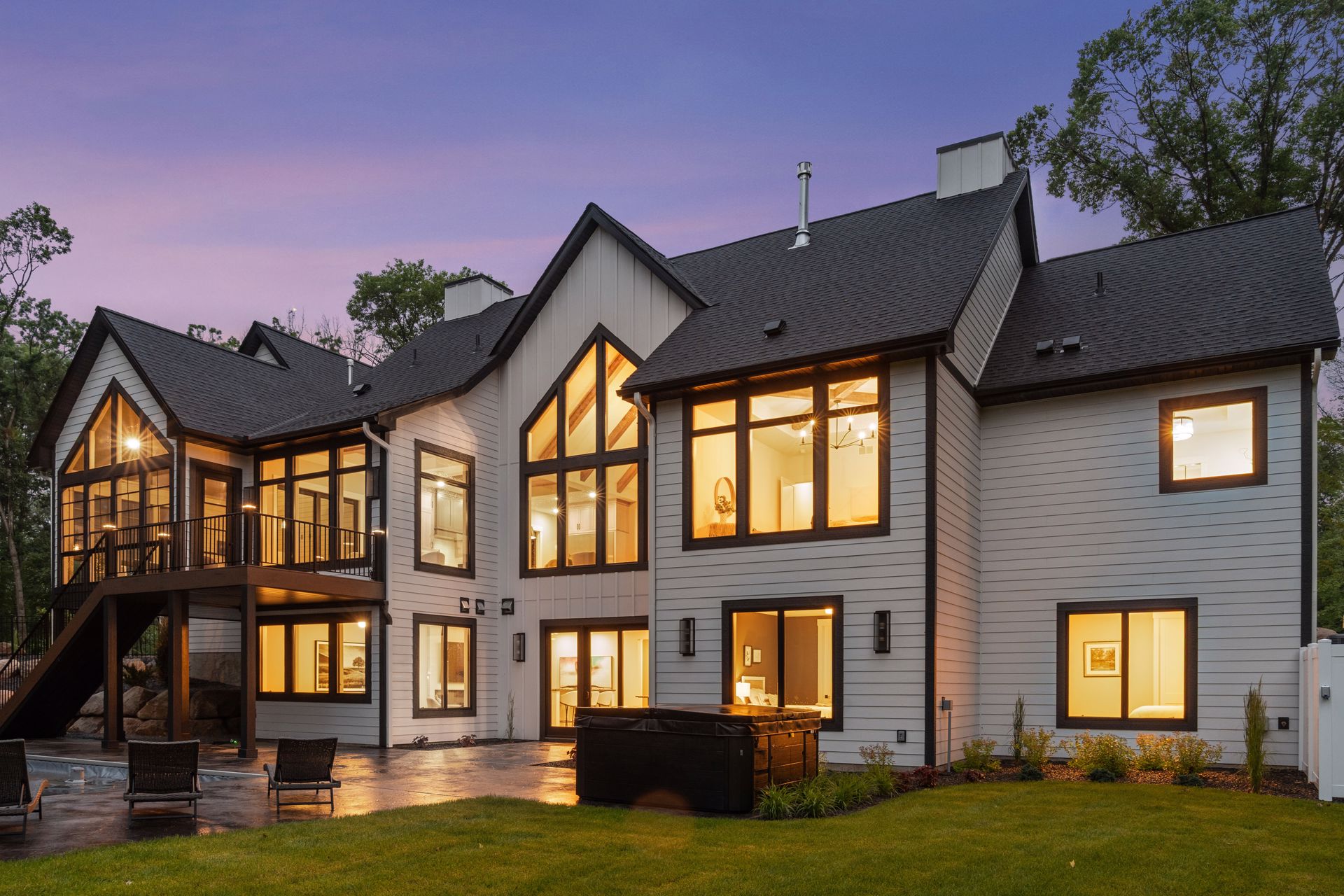 Rear view from exterior of home interior lights